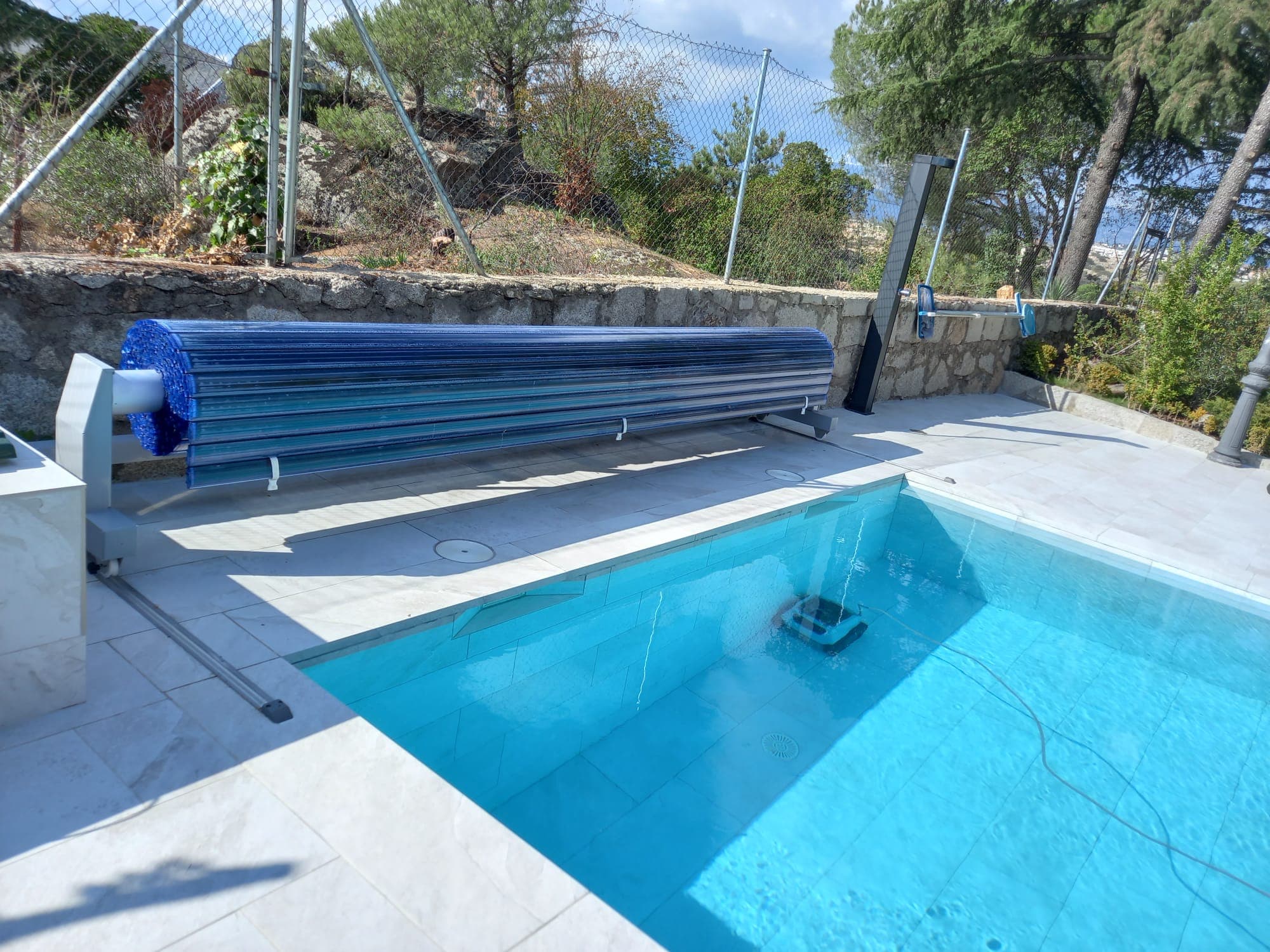 Sistema de cobertor de piscina